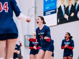 An Iowa United Volleyball club member celebrates during the 2025 Iowa Regionals Weekend.