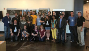 Startup Weekend Iowa City participants pose at MERGE.