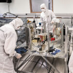 Members of the TRACERS team in the clean room at Van Allen Hall.