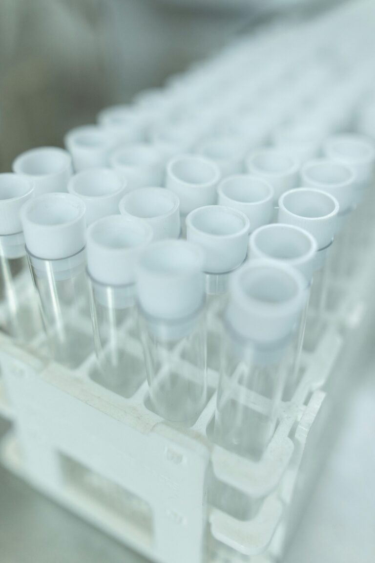 Empty test tubes line a tray