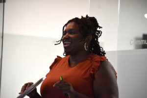 Glide & Go Skate City founder Alicia Crews speaks during a July 30 1 Million Cups presentation at MERGE Iowa City.