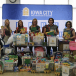 ICAAR’s Community Outreach members pose with donated school supplies in August 2025. From left: Megan Flewellyn, ICAAR CEO; Kayla Fisher, Jessica Campbell, Sarah Miller and Tracey Molina