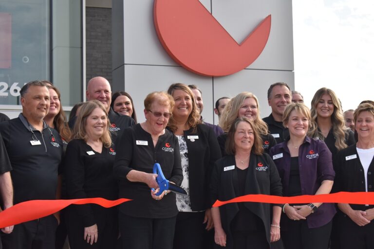 Corda Credit Union staff celebrate the grand opening of Corda's North Liberty branch Sept. 9