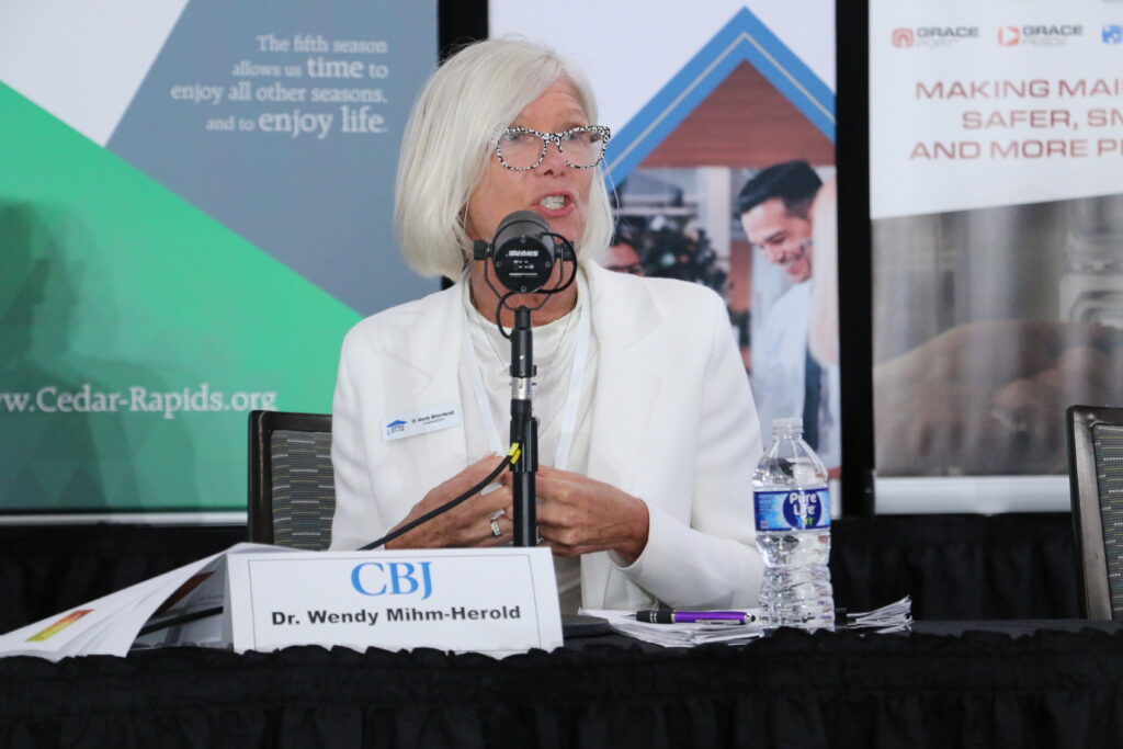 Wendy Mihm-Herold of iJAG addresses workforce development strategies during the Iowa Manufacturing Podcast's live recording at the CBJ Manufacturing Conference in Cedar Rapids