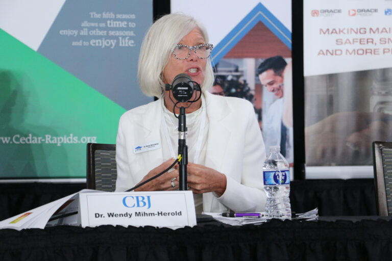 Wendy Mihm-Herold of iJAG addresses workforce development strategies during the Iowa Manufacturing Podcast's live recording at the CBJ Manufacturing Conference in Cedar Rapids
