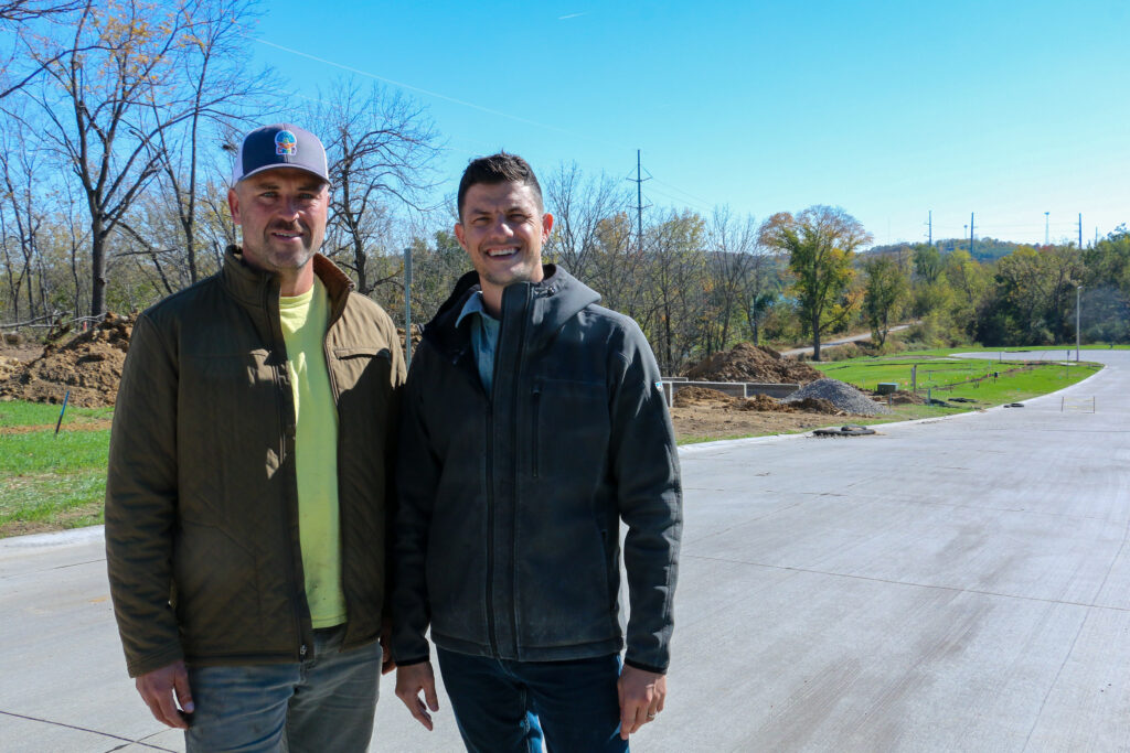 Development roots partners Alex Frazier (left) and Joshua Bass are shown at the site of the Ginkgo Ridge development in southwest Cedar Rapids. CREDIT RICHARD PRATT