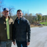 Development roots partners Alex Frazier (left) and Joshua Bass are shown at the site of the Ginkgo Ridge development in southwest Cedar Rapids. CREDIT RICHARD PRATT
