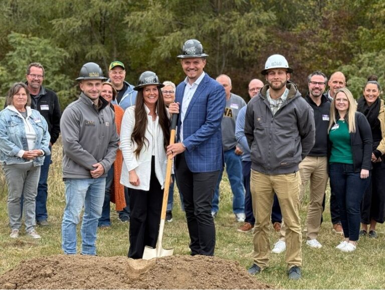 Stephanie and Taylor Getting (center), co-owners of Calyx Creek Lavender & Lodging at the groundbreaking of their new treehouse accommodations Oct. 30.