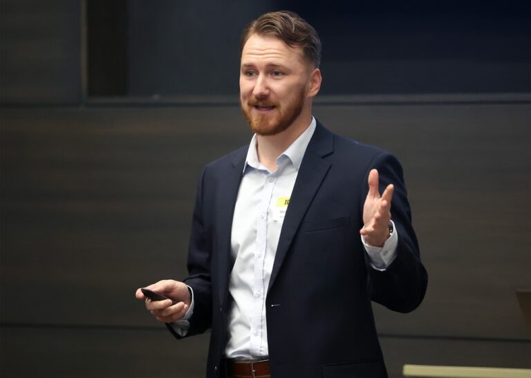 NeuroPred, Inc. co-founder Michal Brzus gives his pitch at the Iowa JPEC AI Pitch Competition Nov. 5.