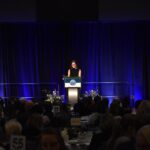Greater Iowa City, Inc. President and CEO Nancy Bird takes the podium at the organization's annual meeting Nov. 20 at the Hyatt Regency Coralville, highlighting Greater IC's economic development efforts over the past year.
