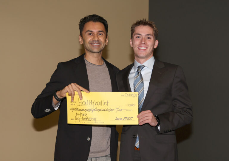 Will Ryan (right), a human physiology major, took first place in the Tech Category with HealthWallet, a patient-controlled platform that centralizes medical and dental information. Mr. Ryan received $1,500.