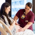 UI Health Care labor and delivery patient with nurse-midwife Amber Goodrich March 2022.
