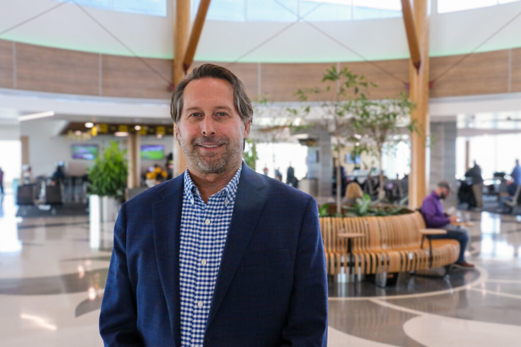 Eastern Iowa Airport director Marty Lenss stands for a portrait in the newest addition to the airport in November. CREDIT RICHARD PRATT