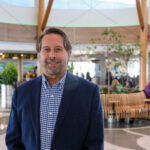 Eastern Iowa Airport director Marty Lenss stands for a portrait in the newest addition to the airport in November. CREDIT RICHARD PRATT