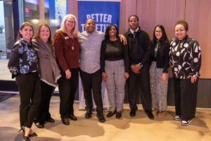 Dream City Executive Director Fred Newell (center) at the Excellence in Action Awards Jan. 29, 2026.