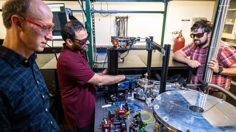 John Prineas, Ravitej Uppu, Thomas Folland work in the Quantum Light Control Lab. The three UI researchers are principal investigators on an award to expand Iowa's materials science center and to explore new ways to leverage materials for quantum technologies.
