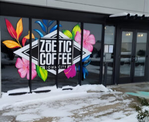 Zoetic Coffee, located at the South District Market at 947 U.S. 6 in Iowa City, displays its new vinyl window graphic.