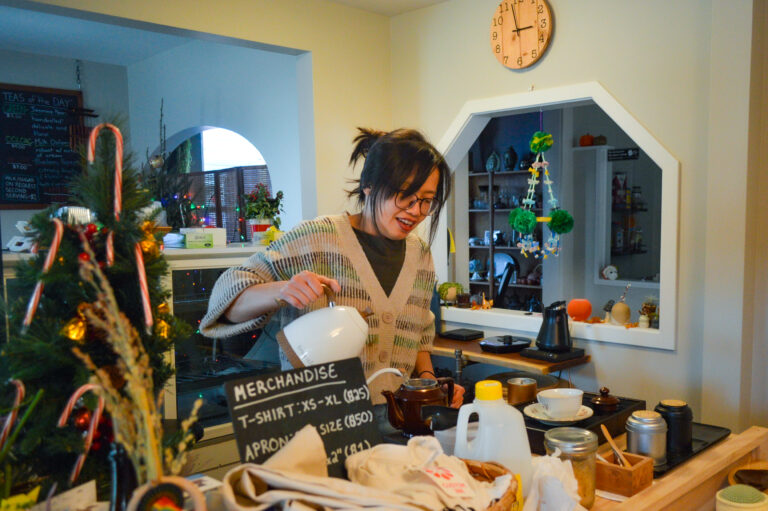 Anh Le, owner of Anh’s Bread Therapy and Tea House, prepares tea in December inside her shop in Czech Village. PHOTOS BY CINDY HADISH