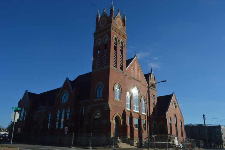 The former Methodist church in Marion, damaged during Iowa's 2020 derecho, is seen in January at the corner of Eighth Avenue and 12th Street. Redevelopment as Belltower Lofts is expected to be completed this summer, with 55 residential units. CREDIT CINDY HADISH