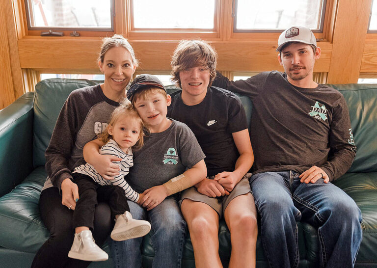 The Siecks pose for a family photo at Crescent Cove Respite & Hospice Home for Kids in Minneapolis in 2021. (From left) Shanna, Izabella, Mason, Colton and Curtis Sieck. Ms. Sieck said it was the last photograph they took as a family before Mason died. CREDIT JOY BY JO PHOTOGRAPHY