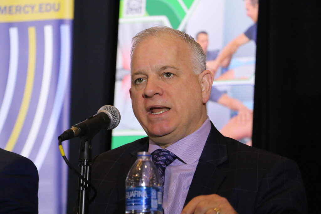 Dr. Timothy Quinn, president and CEO of Mercy Cedar Rapids speaks at the CBJ's Health Care Symposium on Wednesday, February 11, at the Hyatt Regency in Coralville. CREDIT RICHARD PRATT