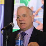 Dr. Timothy Quinn, president and CEO of Mercy Cedar Rapids speaks at the CBJ's Health Care Symposium on Wednesday, February 11, at the Hyatt Regency in Coralville. CREDIT RICHARD PRATT