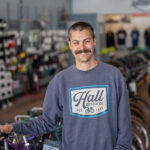 Hall Bicycle owner Kyle Moscrip stands for a portrait in the retail showroom of his bicycle shop in downtown Cedar Rapids. CREDIT KYLE MOSCRIP