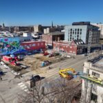 An aerial photo shows the empty lot at 21 S. Linn St.