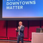 Jason Ilstrup, president of Downtown Madison, Inc., gives the keynote speech on campus downtowns.