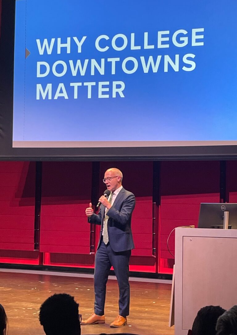 Jason Ilstrup, president of Downtown Madison, Inc., gives the keynote speech on campus downtowns.