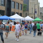 Customers make their way through the Downtown Farmers Market in Cedar Rapids during opening day in 2025. Iowa’s farmers market season begins in May, with the large-scale downtown market opening on May 30.