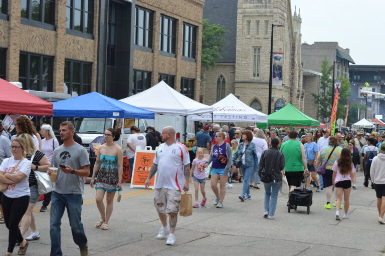 Customers make their way through the Downtown Farmers Market in Cedar Rapids during opening day in 2025. Iowa’s farmers market season begins in May, with the large-scale downtown market opening on May 30.