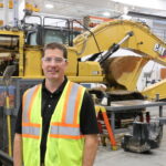 Altorfer CAT president Derek Altorfer stands in the service area of the company’s headquarters at 8400 Sixth St. SW in Cedar Rapids. CREDIT RICHARD PRATT