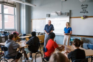 Laura Wirth providing financial education to Zach Johnson’s Foundation - Kids on Course program. CREDIT TRANSAMERICA