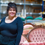 Destiney Benish, owner of Annata Vintage Rental Co., is shown in her warehouse in Palo. CREDIT CINDY HADISH