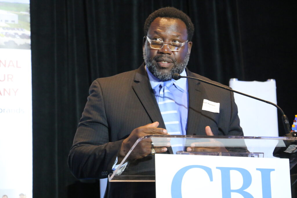 Corridor Business Journal 2026 Entrepreneur of the Year Trevor Bollers speaks at the Corridor Business Journal’s Fastest Growing Companies event Thursday, July 16 at the Coralville Convention Center. CREDIT RICHARD PRATT