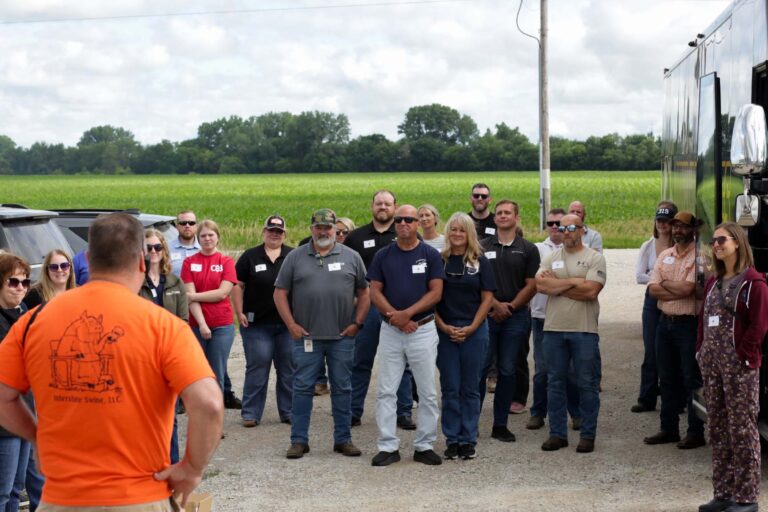 Attendees tour Interstate Swine near Walker, Iowa where Todd and Denise Wiley shared a behind-the-scenes look at modern pork production.